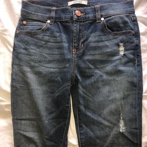 Distressed medium wash jeans